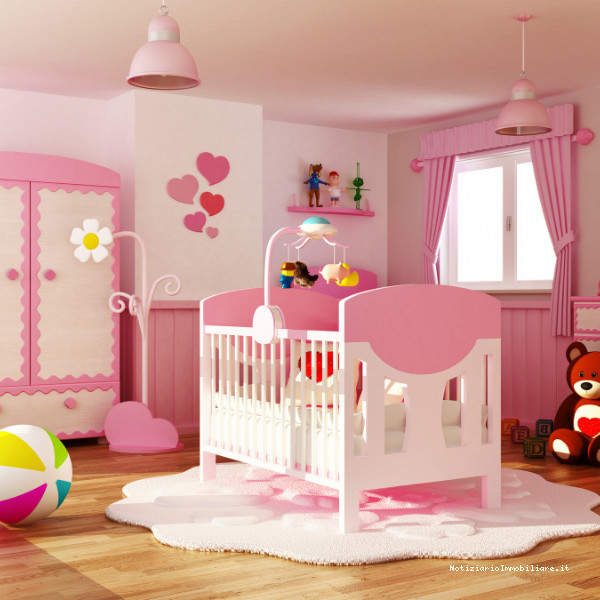 Cameretta per neonata rosa e bianca con culla e armadio